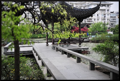 A beautiful approach image to the central lake pavilion, at the Hangzhou Community Hall Garden.