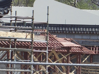 Work is also underway on the Half Pavilion by the Pond, the " Scholar's Study," and covered corridors, surrounding the enclosed garden.