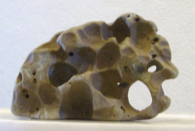 Another example of a scholar's rock, with plenty of eye-holes, through.