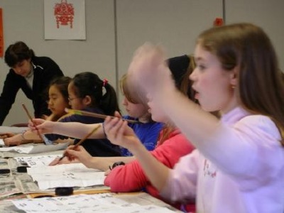 Western children, alongside East learning Chinese art