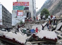 Earthquake damage to inner city building structures.