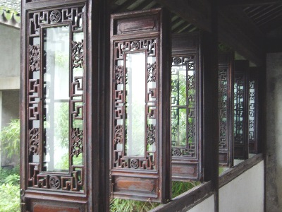 Beautiful lattice-work shutter windows, inside a Chinese pavilion.